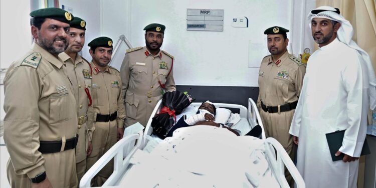 Emirates Road Accident: Dubai Police Officials Visit Injured Victims in Hospital Subheadline: In a commendable gesture of community care, high-ranking officers review medical treatment and assure full support to families following a major traffic collision.