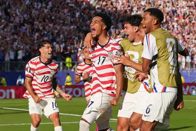 Ten-man USA secures historic 2-0 victory over Bosnia and Herzegovina to advance to the FIFA World Cup 2026 knockout stage.