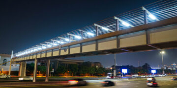 Pedestrian bridge in Dubai equipped with smart motion-sensor LED lighting.