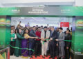 Huna AE Hypermarket management and social media influencers at the grand opening ribbon-cutting ceremony in Al Khail Mall, Dubai.