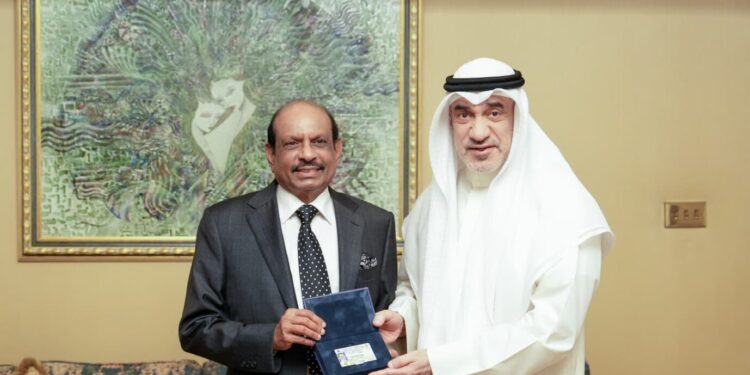 LuLu Group Chairman M.A. Yusuff Ali receiving Kuwait's first Golden Residency visa from First Deputy Prime Minister Sheikh Fahad Yousef Saud Al-Sabah at Bayan Palace.