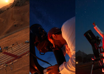 High-powered optical telescope set up in Mleiha desert against a starry night sky during the Perseids meteor shower.