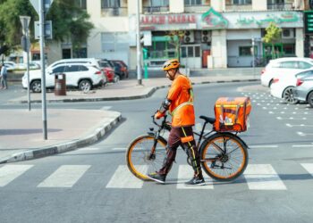 RTA delivery e-bike operating in Dubai Marina.
