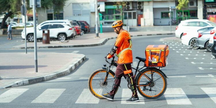 RTA delivery e-bike operating in Dubai Marina.