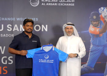Indian cricketer Sanju Samson posing during the brand partnership signing ceremony with Al Ansari Exchange executives in Dubai.