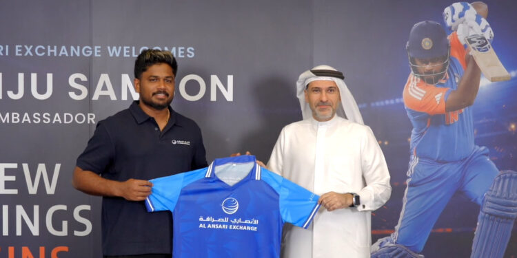 Indian cricketer Sanju Samson posing during the brand partnership signing ceremony with Al Ansari Exchange executives in Dubai.