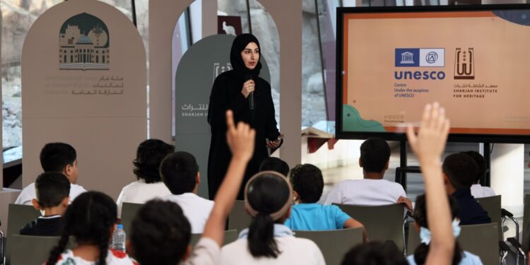 Children engaging in creative writing and storytelling at the Sharjah Public Libraries Summer Camp 2026.