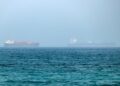 An oil tanker has been disabled off Ash Shishah, Oman, after an unidentified projectile hit its engine room. Crew reported safe as security alerts widen near Strait of Hormuz.