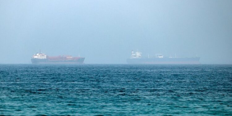 An oil tanker has been disabled off Ash Shishah, Oman, after an unidentified projectile hit its engine room. Crew reported safe as security alerts widen near Strait of Hormuz.