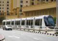 Passengers boarding a Dubai Metro train at BurJuman interchange station in Dubai.