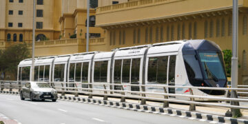Passengers boarding a Dubai Metro train at BurJuman interchange station in Dubai.