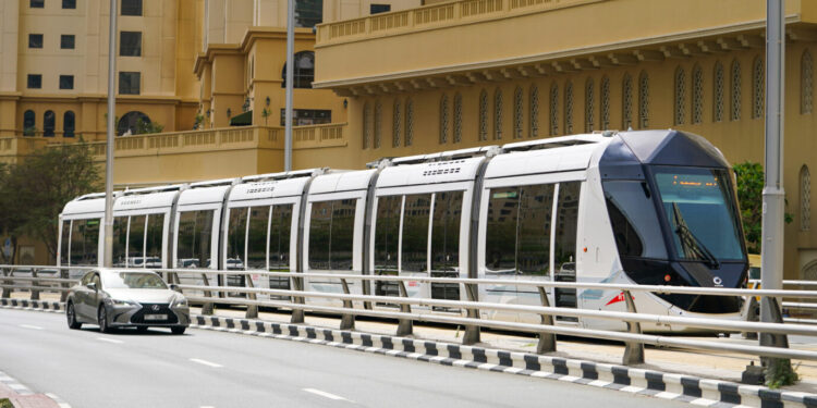 Passengers boarding a Dubai Metro train at BurJuman interchange station in Dubai.