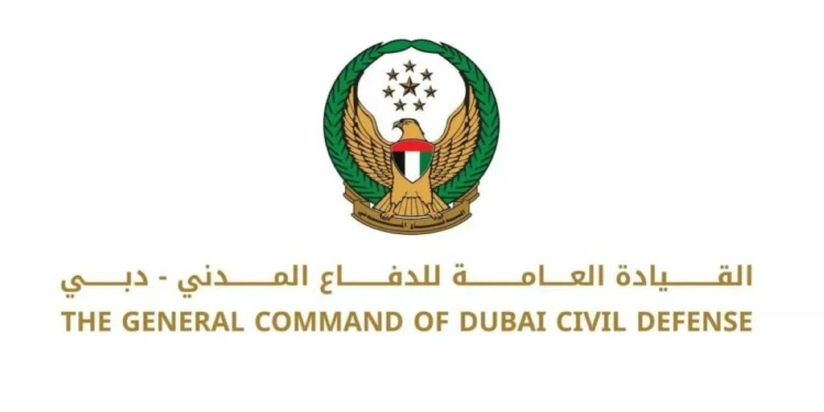 Dubai Civil Defence emergency vehicles parked near Sheikh Zayed Road during an emergency response.
