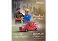 GDRFA Dubai officials and Farjan Dubai volunteers distributing cold drinks and ice cream to workers at a construction site in Dubai.