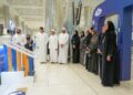 High school students participating in the GDRFA Summer Talents program at Dubai International Airport