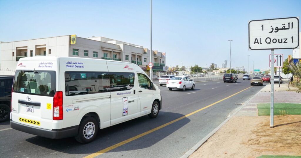 RTA Dubai Bus-On-Demand minibus operating on a city street