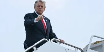 US President Donald Trump walking from Air Force One after arriving at Morristown Municipal Airport from Camp David.