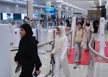 Over 745,000 passengers cleared DXB immigration via Dubai's contactless 'Red Carpet' corridor in 2026, slashing border clearance times to 3.4 seconds.