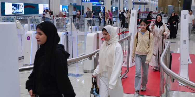 Over 745,000 passengers cleared DXB immigration via Dubai's contactless 'Red Carpet' corridor in 2026, slashing border clearance times to 3.4 seconds.