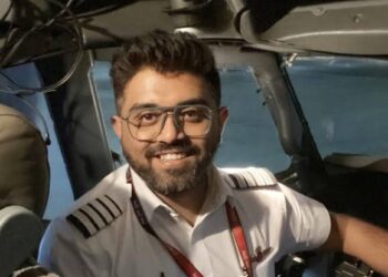 Discover hCaptain Smit Machchhar, who kept the cockpit open despite serious injuries.. Source: DD Indiaow Indian pilot Captain Smit Machchhar saved 174 lives by fighting off a co-pilot knife attack mid-flight, earning praise from PM Modi.